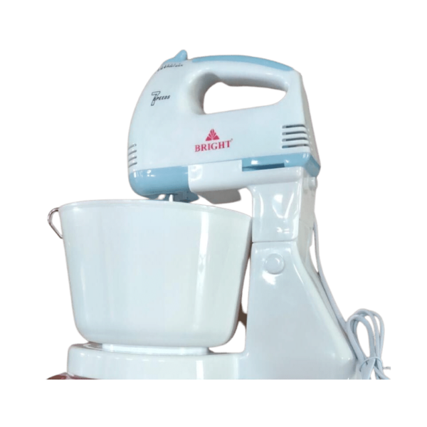 **Image Description:** A white-colored hand mixer with a 2L plastic bowl set on a kitchen countertop, reflecting the culinary culture of Sri Lanka. The mixer is equipped with heavy-duty chrome beaters and kneading hooks, catering to the diverse cooking styles of Sri Lankan cuisine. The control panel on the mixer features 7-speed settings, offering versatility to adapt to various Sri Lankan recipes. The ergonomic handle of the mixer is designed for comfort and control, appealing to the practicality valued in Sri Lankan households. The spacious plastic bowl is next to the mixer, symbolizing the preparation of generous portions for Sri Lankan family gatherings. The scene is well-lit, emphasizing the importance of vibrant flavors and textures in Sri Lankan dishes.